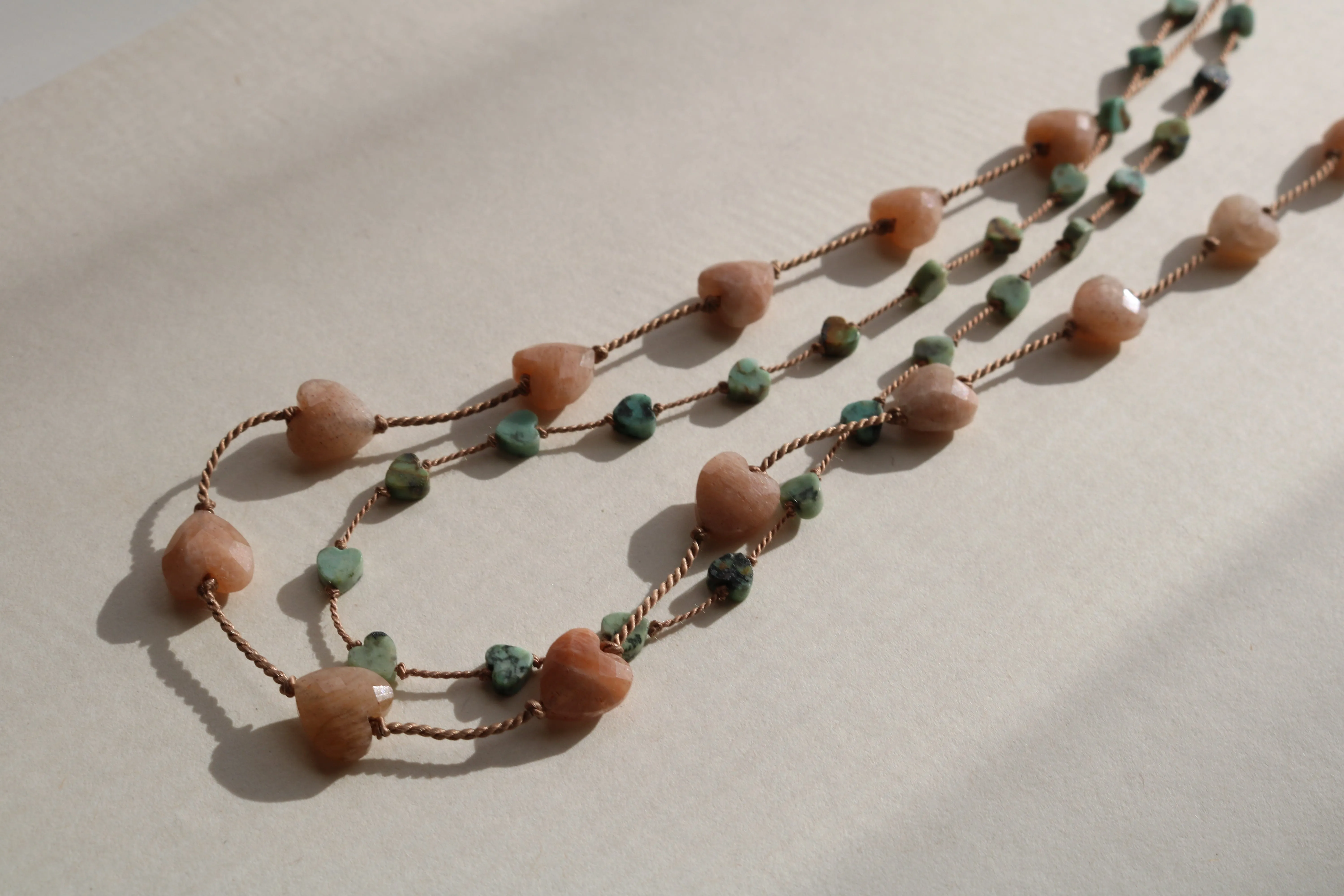 AFRICAN TURQUOISE JASPER HEARTS OM NECKLACE