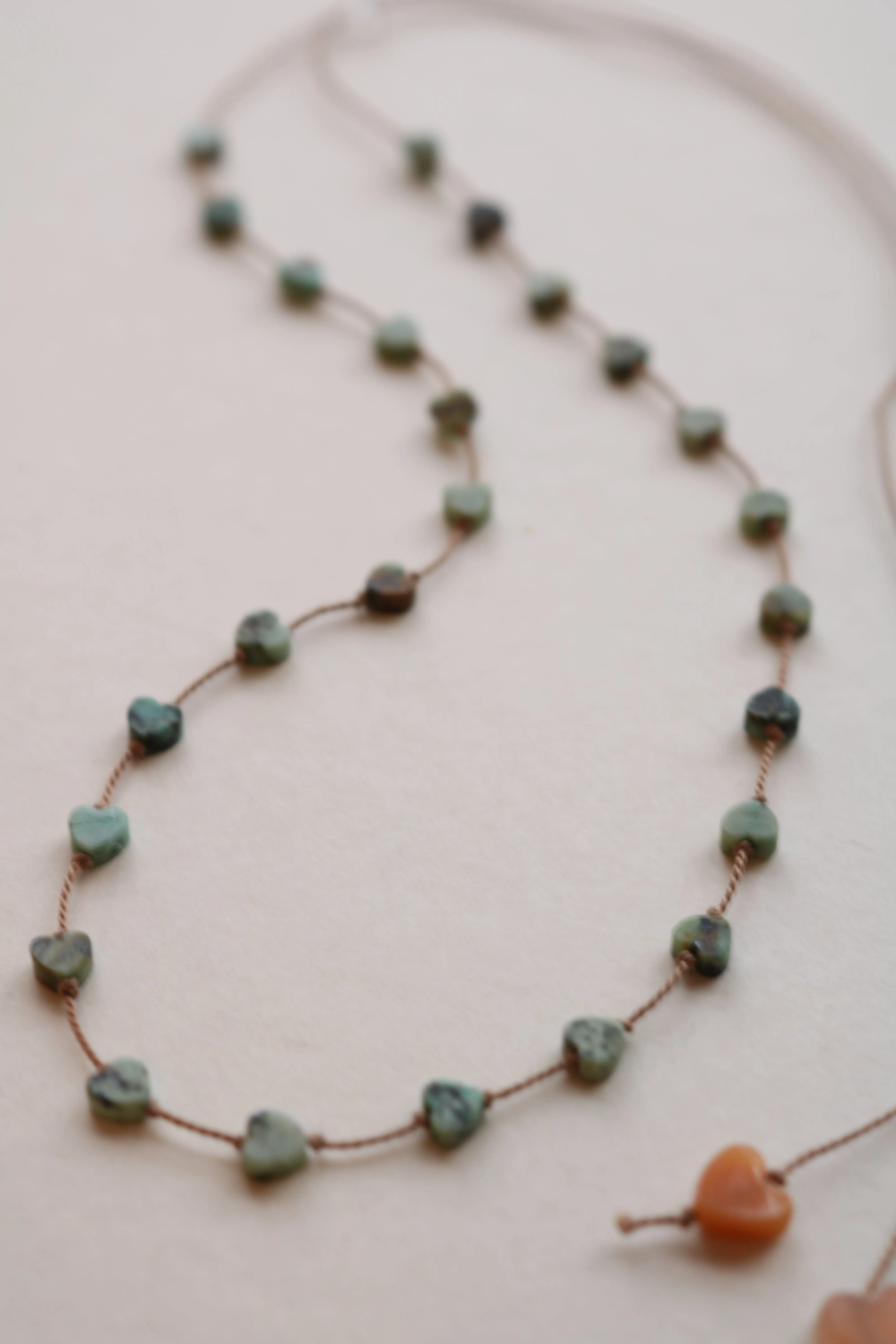 AFRICAN TURQUOISE JASPER HEARTS OM NECKLACE