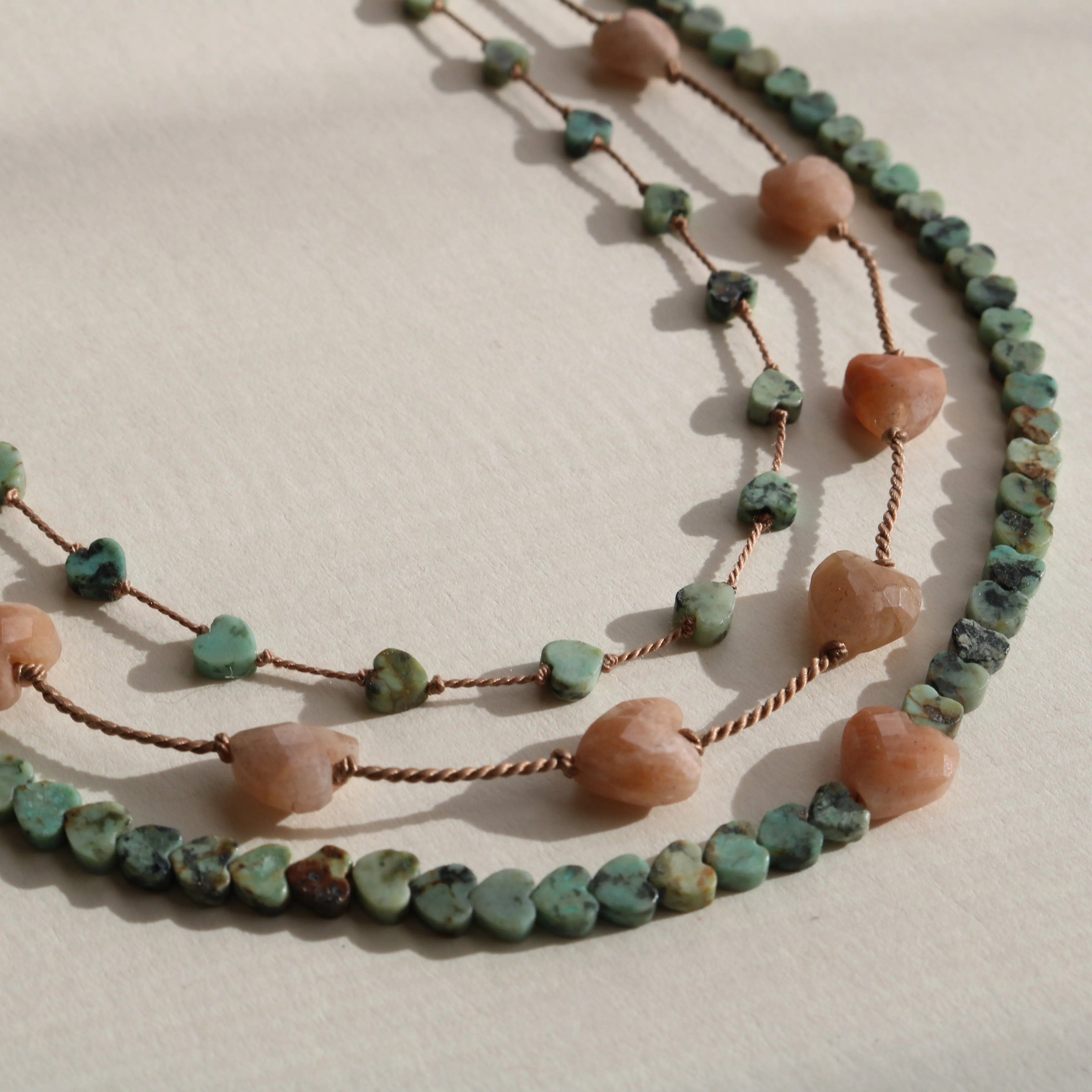 AFRICAN TURQUOISE JASPER HEARTS OM NECKLACE