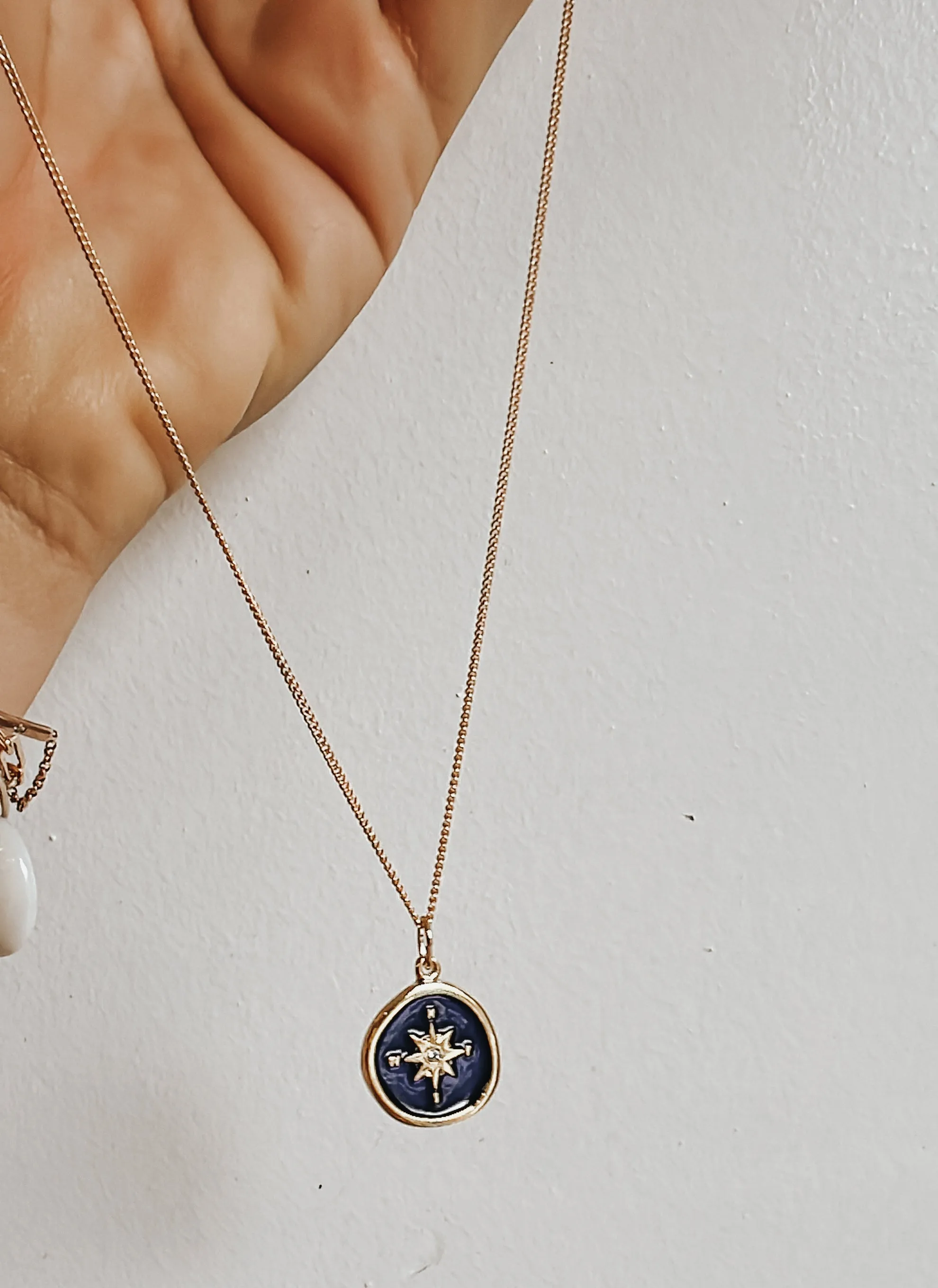 Blue enamel compass charm