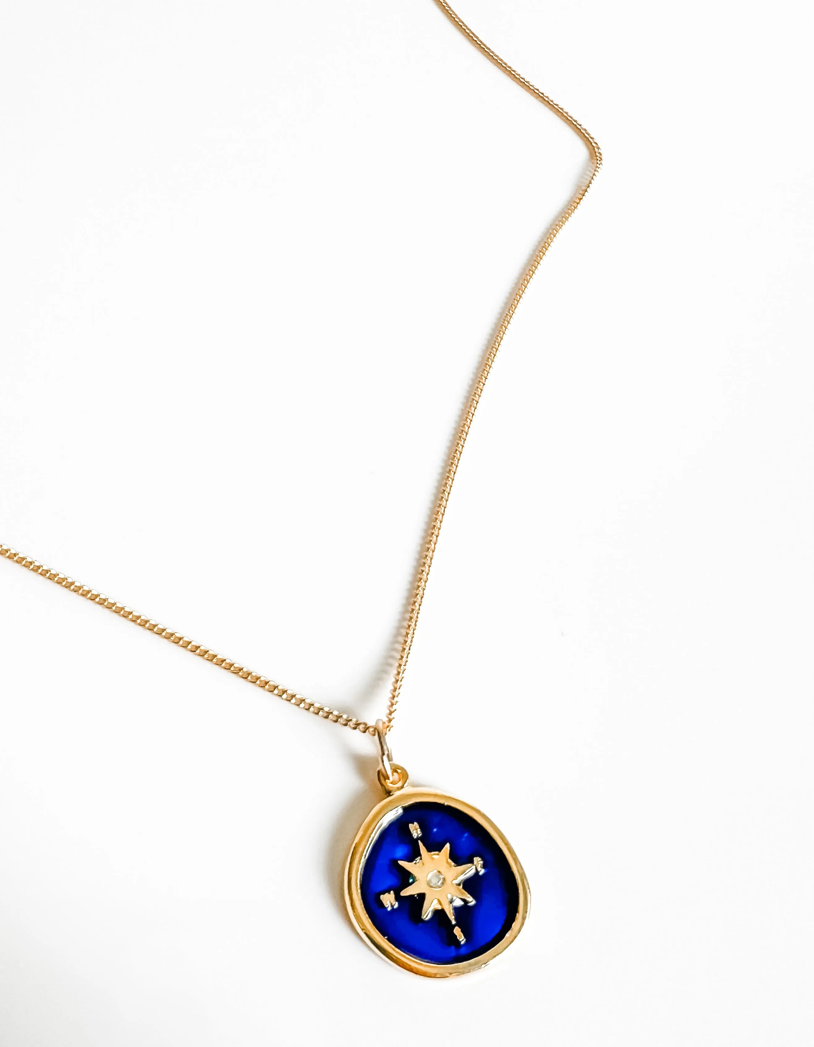 Blue enamel compass charm