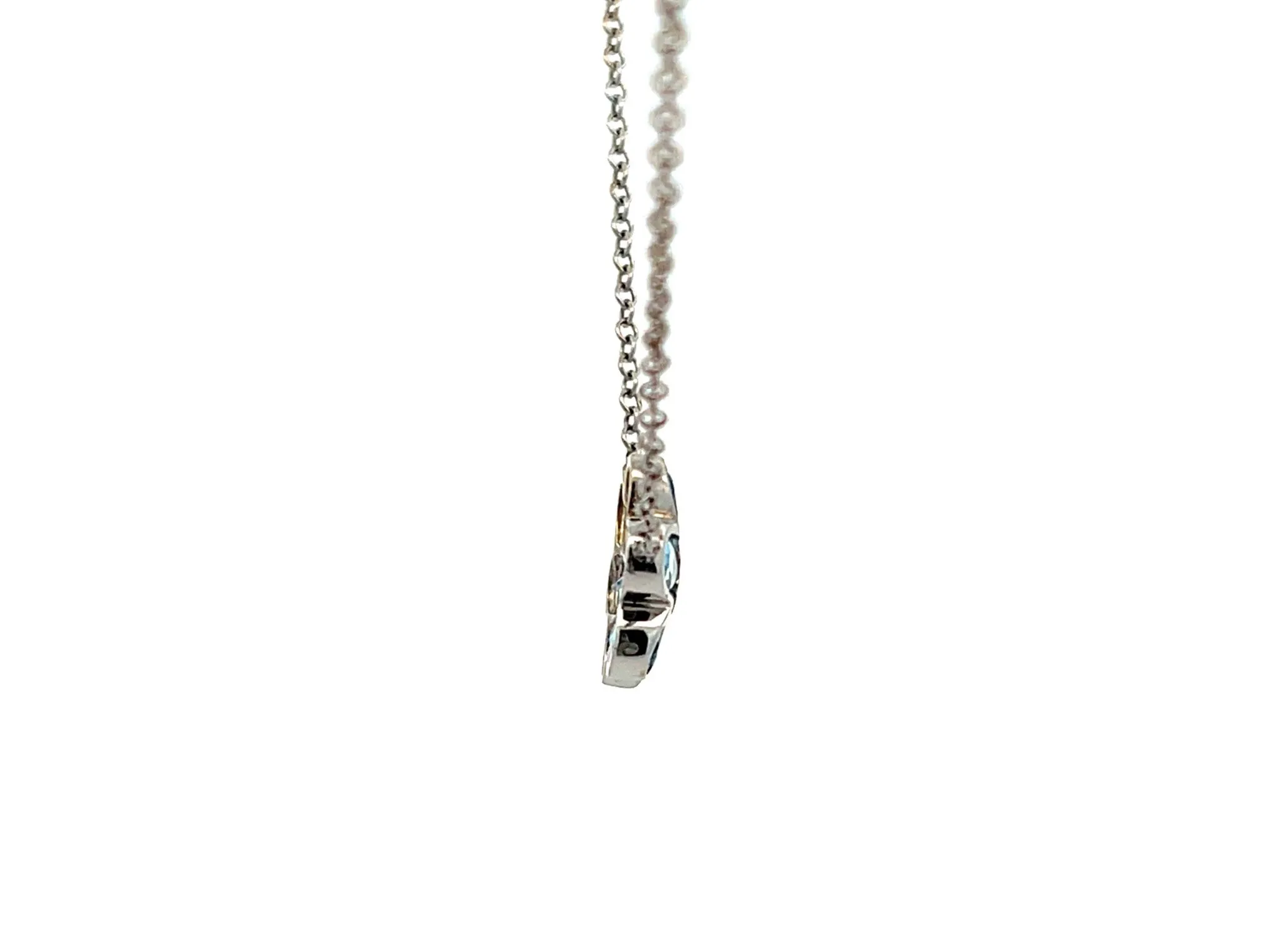 Blue Topaz and Pink Tourmaline Flower Necklace in 14k White Gold