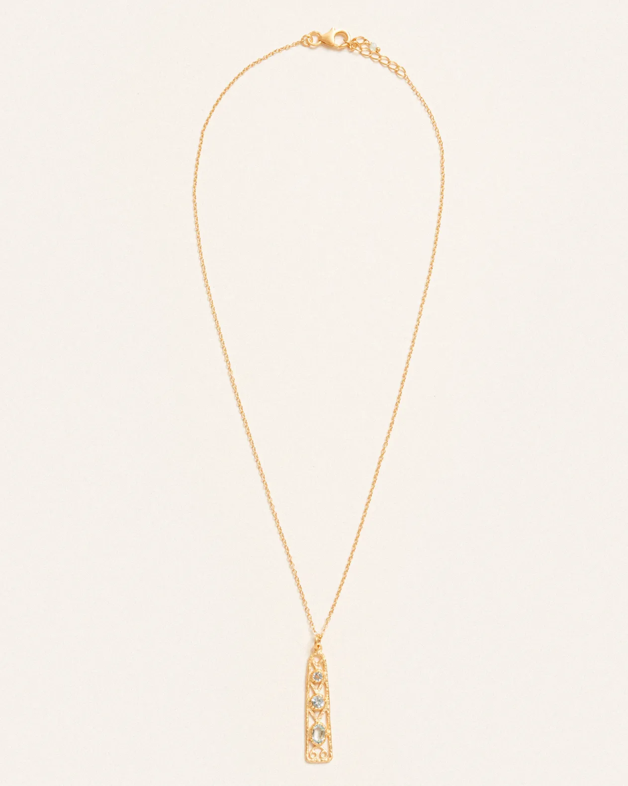 Delta pendant with blue topaz