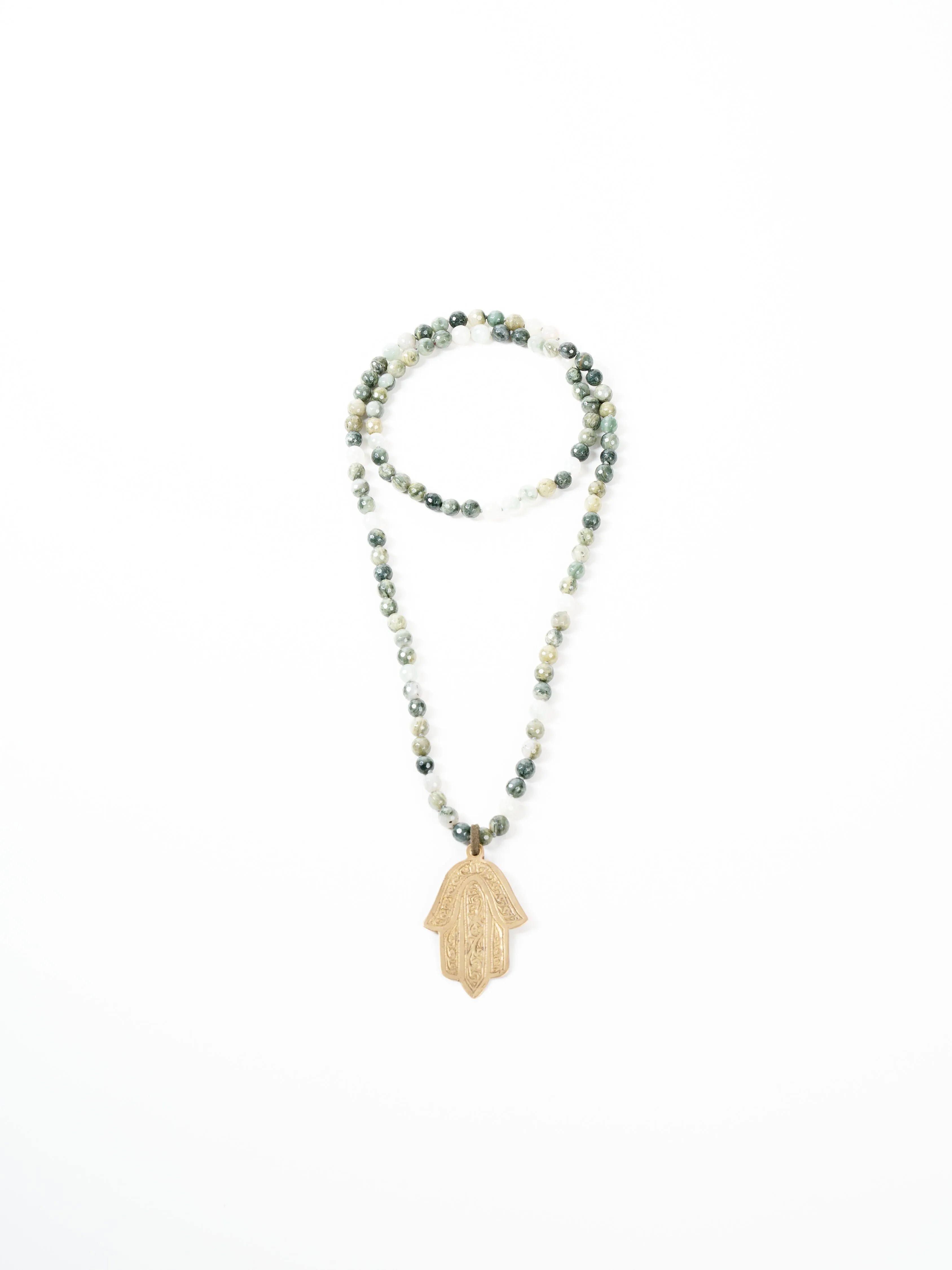 green rutilated necklace - bronze hamsa