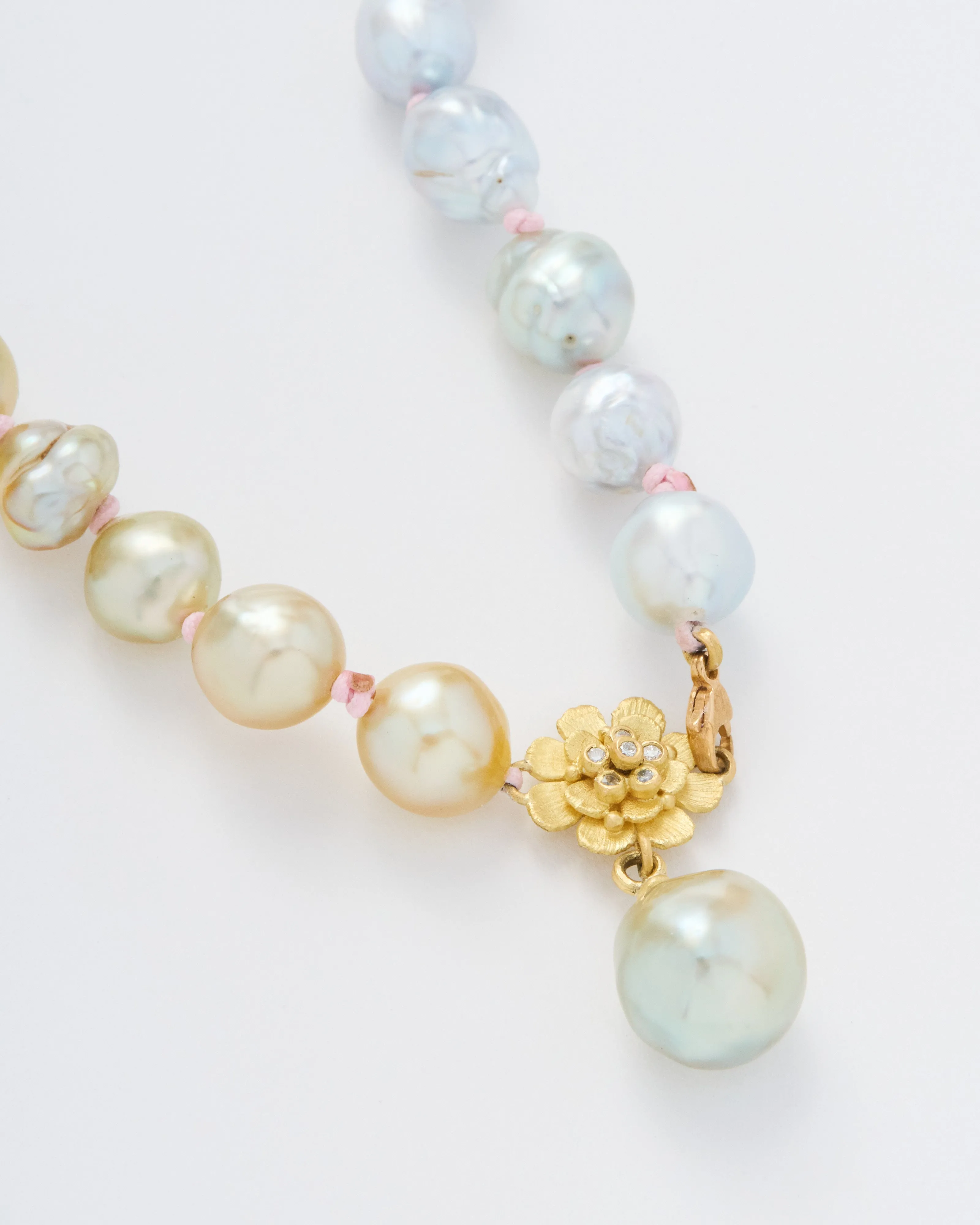 pearl necklace with flower and diamonds