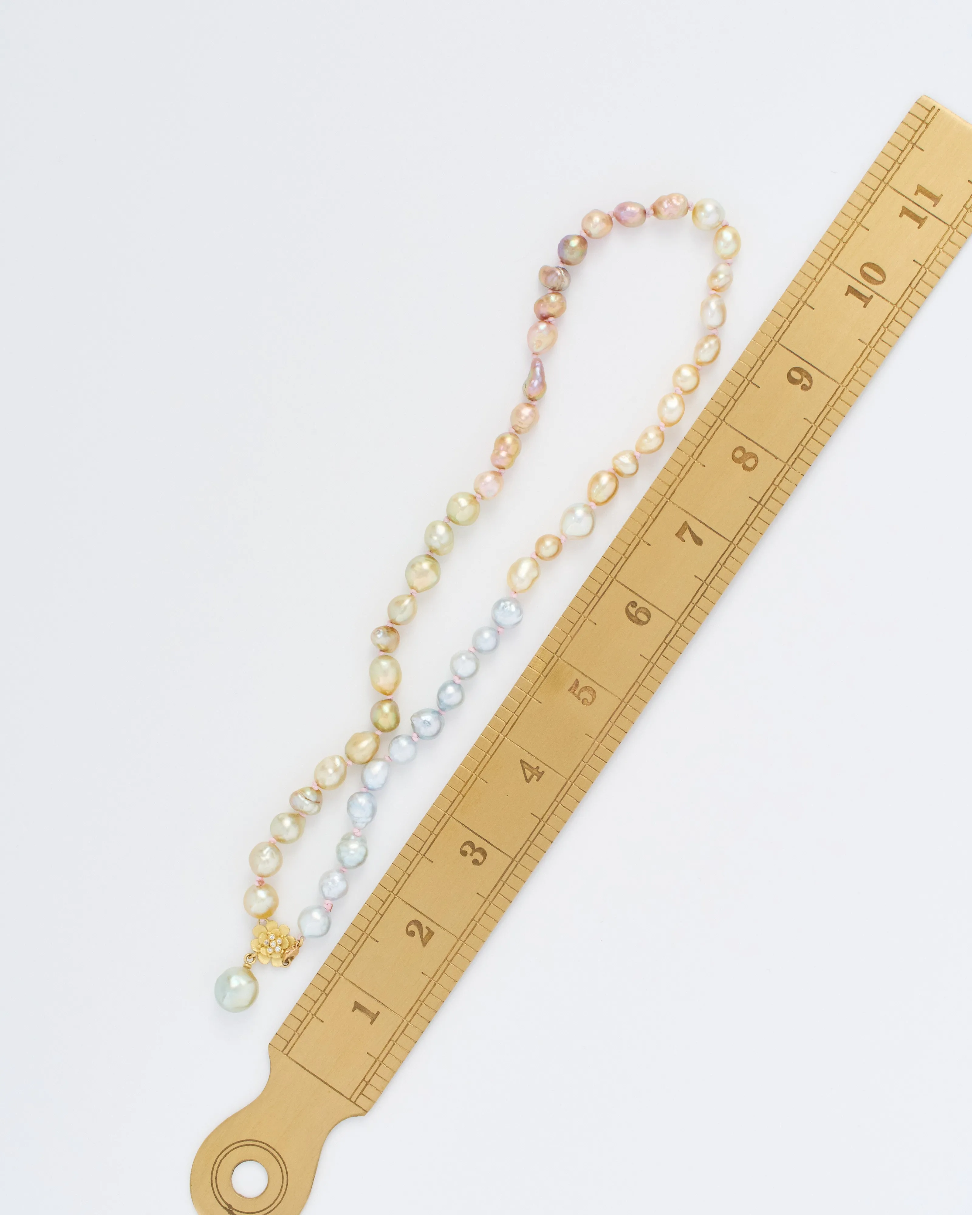 pearl necklace with flower and diamonds