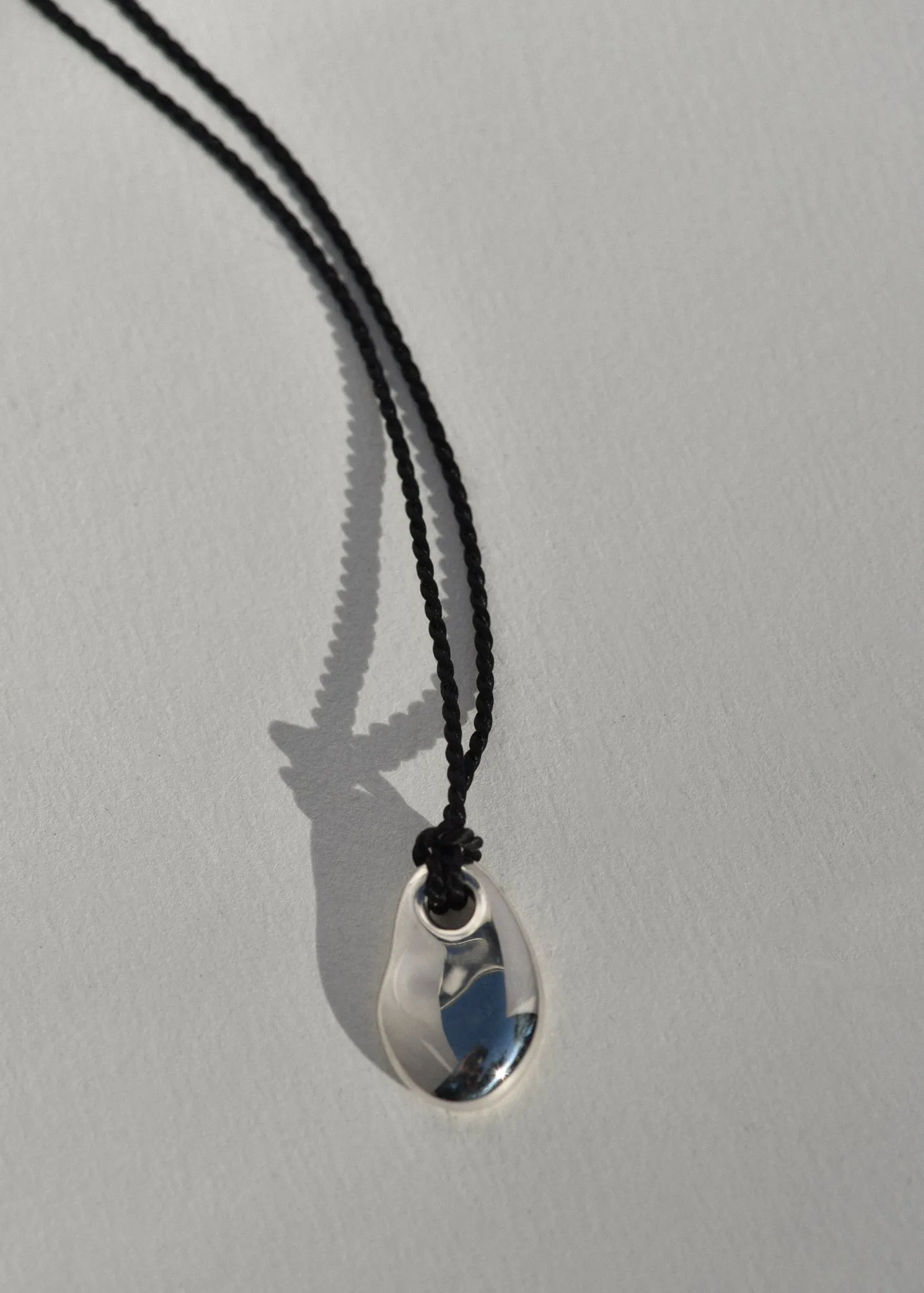 Sea Stone Pendant on Silk Cord