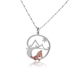 Skier in the Mountains with Snowflake Pendant